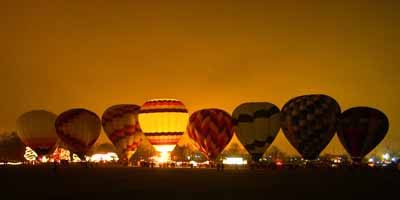 The balloonTop Secret glows in Smith Park Monday night, Dec. 6, 2004 during the annual Christmas Balloon Glow in Middletown. (Gary Stelzer/Middletown Journal)